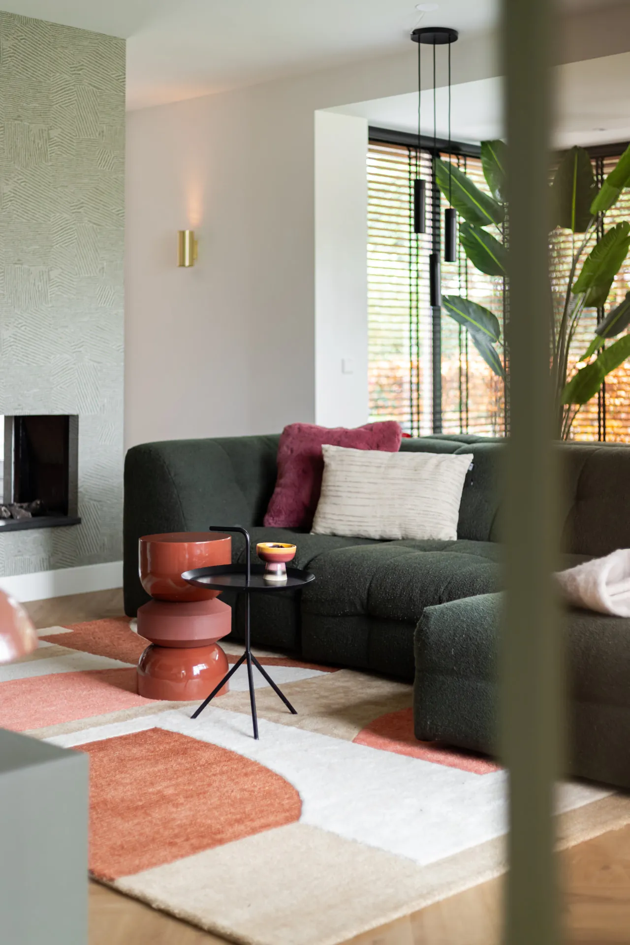 Licht interieuradvies woonkamer met zitbank en warme sfeer